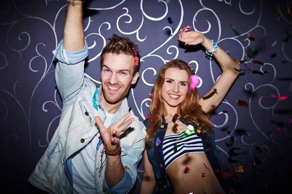 Ecstatic couple having fun at party