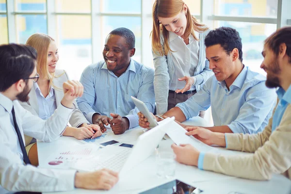 Group of happy colleagues   in office