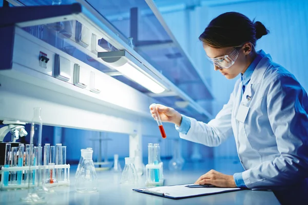 Scientist working with chemical liquids