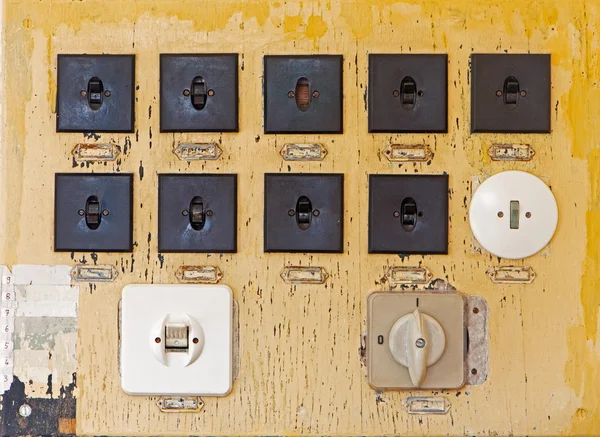 Old electric switches on the wall