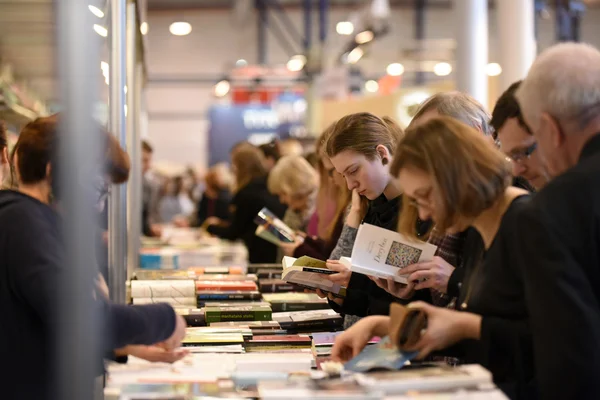 People choose books at the indoor book market