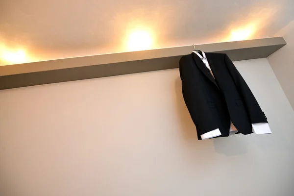 Hanging groom suit