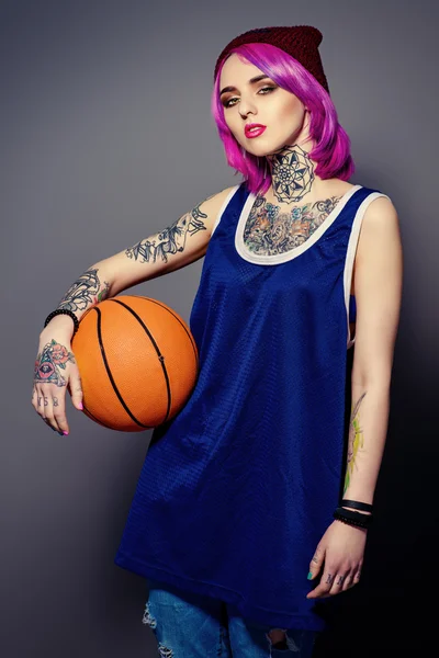 Sportive girl. Tattoo.