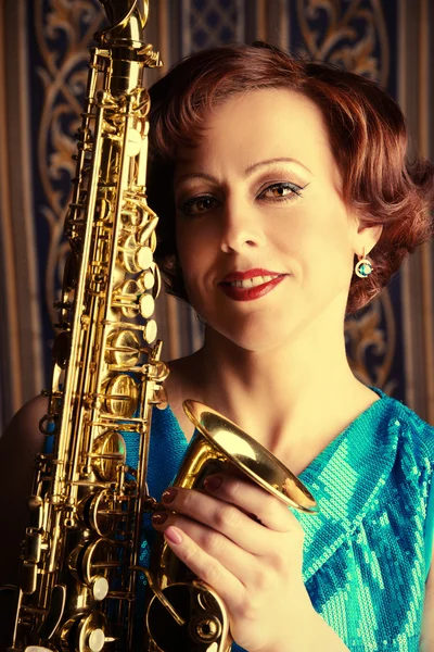 Professional musician. Beautiful actress with saxophone.