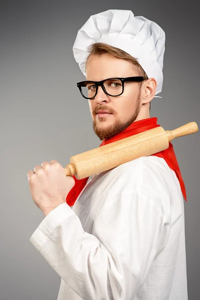 Serious cook. Portrait of a male chef cook in uniform.