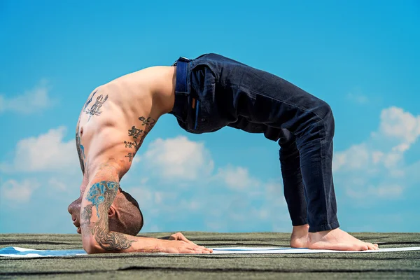 flexibility man. Yoga concept.