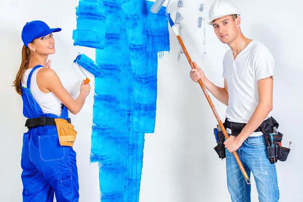 Blue paint. Repair, construction and mortgage concept.