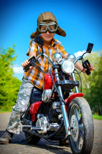 Young motorcyclist. Adventure. Summer holidays.