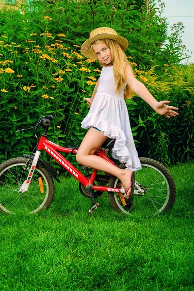 Cycling girl. Happy childhood.