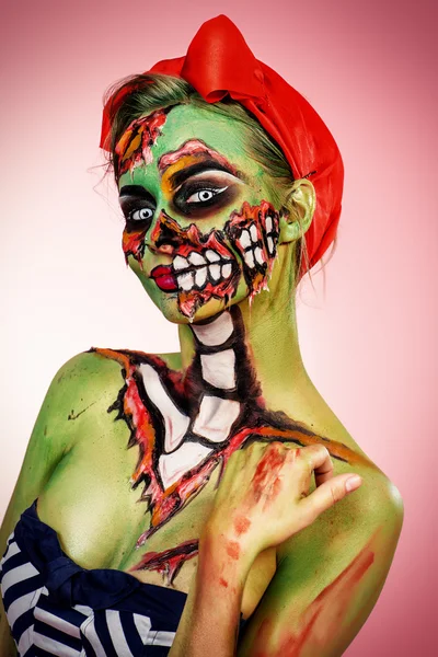 Halloween look. Portrait of a pin-up zombie woman