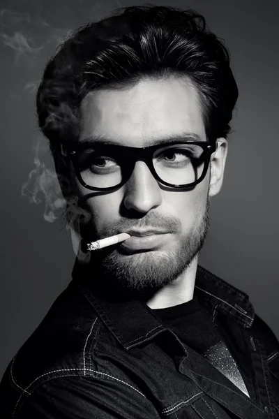 Portrait of a smoking man