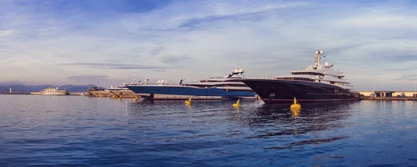 Panorama of a luxury super yachts docking at the port of Mediterranean French Riviera