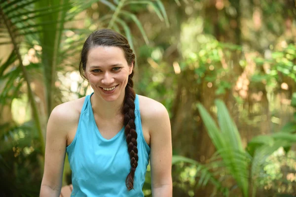 Woman with sarcastic grin or smile