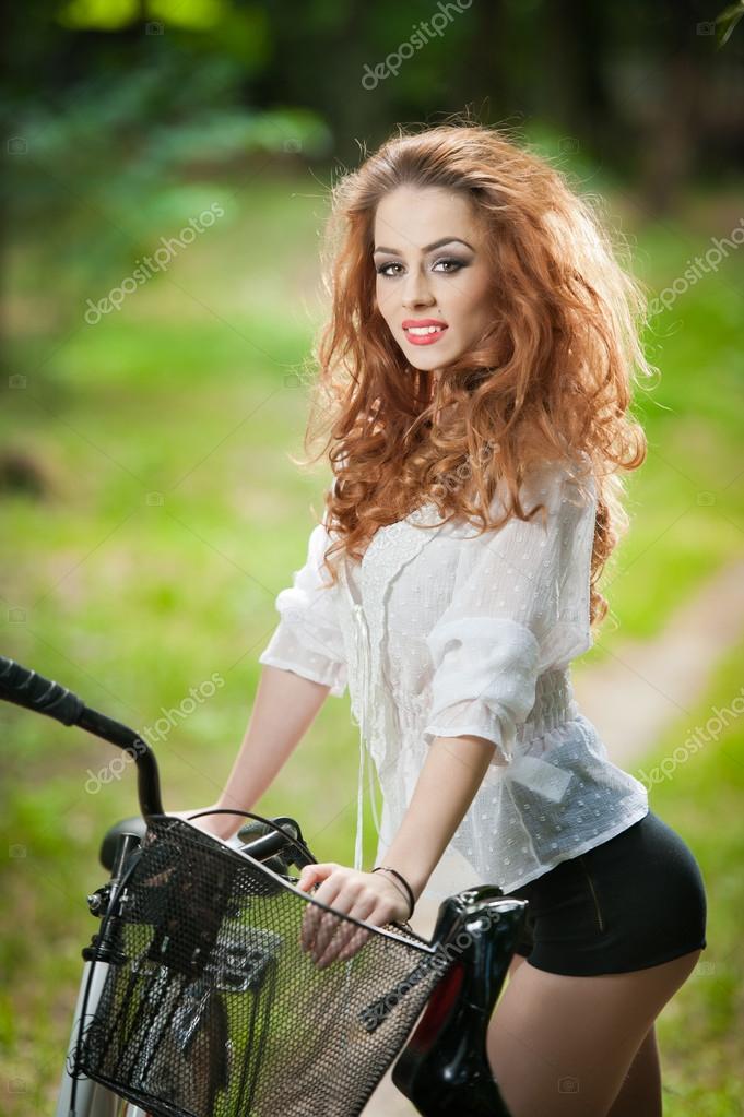 Curly Haired Redhead Outdoors 66