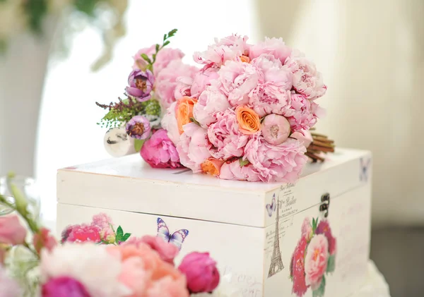 Wedding decoration on table. Floral arrangements and decoration. Arrangement of pink and white flowers in restaurant for luxury wedding event