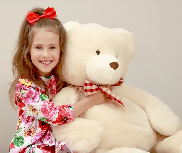 Girl with Teddy bear