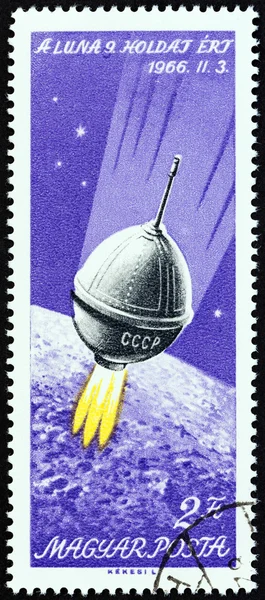 HUNGARY - CIRCA 1966: A stamp printed in Hungary issued for the Moon Landing of Luna 9 mission shows Luna 9 in space, circa 1966.