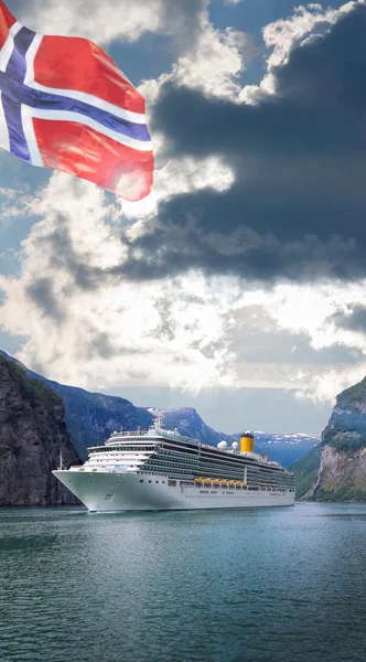 Geiranger fjord with cruise against sunset in Norway