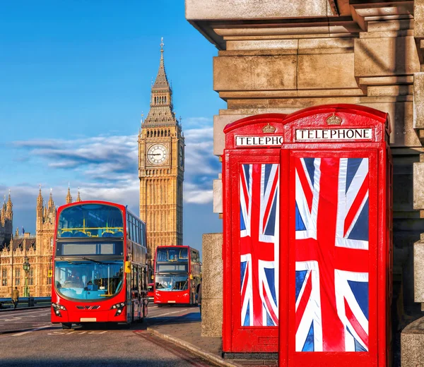 British Union flags on phone booths against Big Ben in London, England, UK