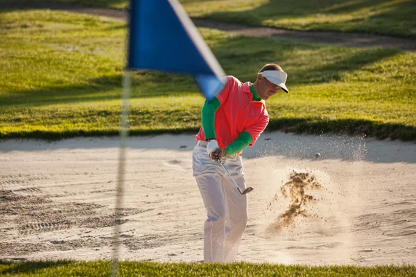 Man playing golf