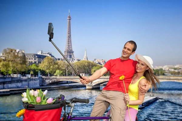 Couple Taking Selfie by Eiffel Tower in Paris, France