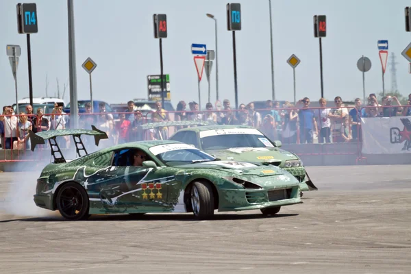 Drift cars team Round-X enters the bend with slip