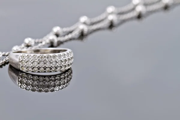 Silver ring with precious stones and fine silver chain