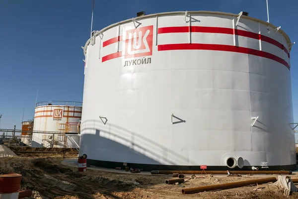 Huge storage tanks for petroleum products with the logo of LUKOI