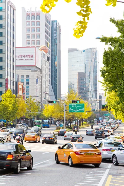 Traffic approaching on a busy road through the Gangnam district