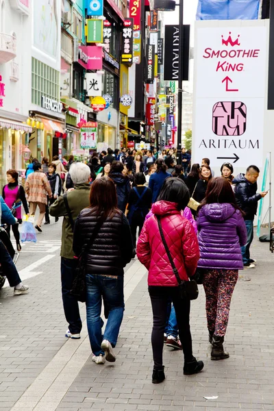 Young people shopping in the Myeongdong Shopping Street
