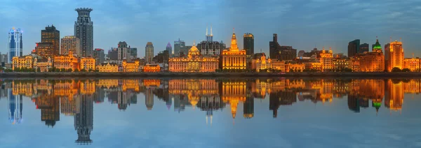 Skyline of The Bund, marvellous historical buildings and Huangpu River on sunset, Shanghai, China