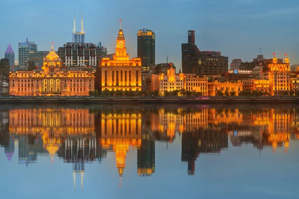 Skyline of The Bund, marvellous historical buildings and Huangpu River on sunset, Shanghai, China