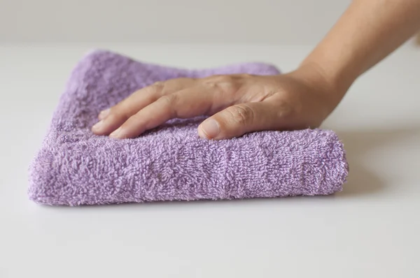 Hand with towel.