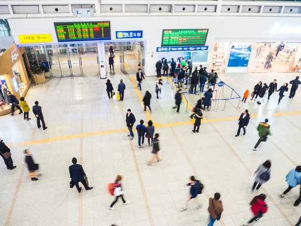 Passengers inside of Seoul Station.