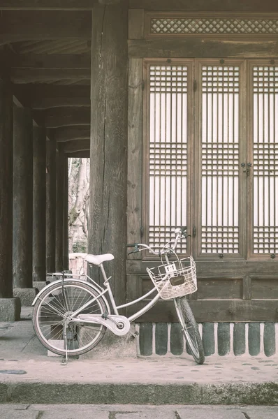Bicycle parking against asian style house