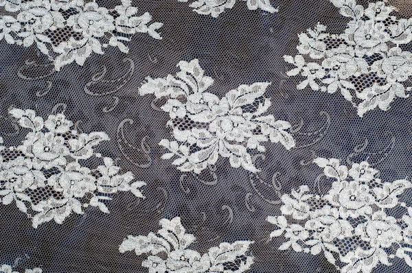 Lace on the fabric. tissue, textile, cloth, fabric, material, te