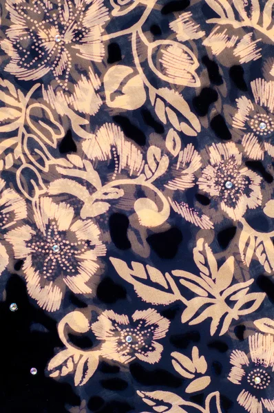 Texture silk cloth. dark blue with gold-painted flowers