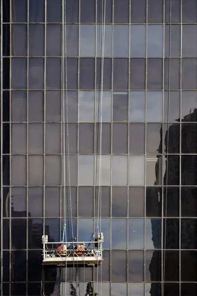 Window cleaner on high rise building