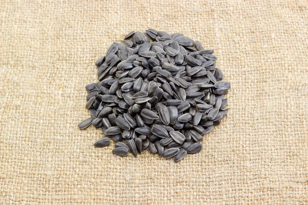 Pile of sunflower seeds on a sackcloth