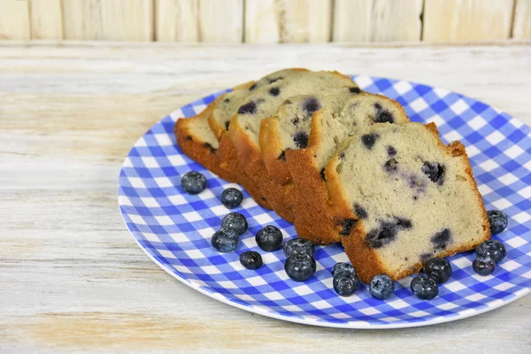 Blueberry bread on checkered plate