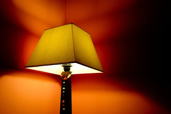 The lamp in the corner