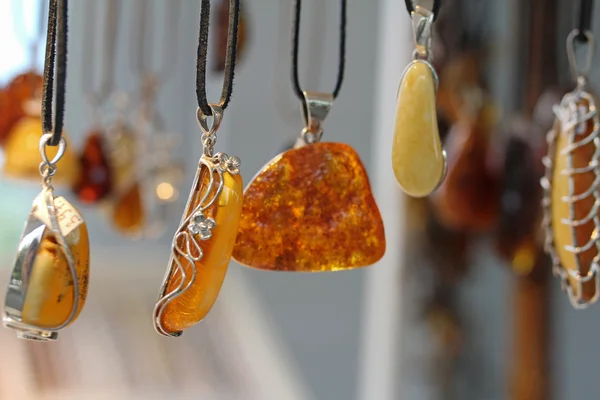 Pendants with amber for sale in Sopot, Poland. Amber is the most Amber is the most popular souvenir from the polish baltic coast.