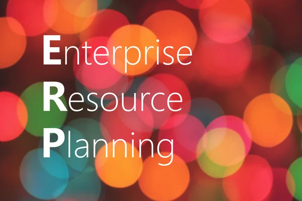 ERP (Enterprise Resource Planning) acronym on colorful bokeh background