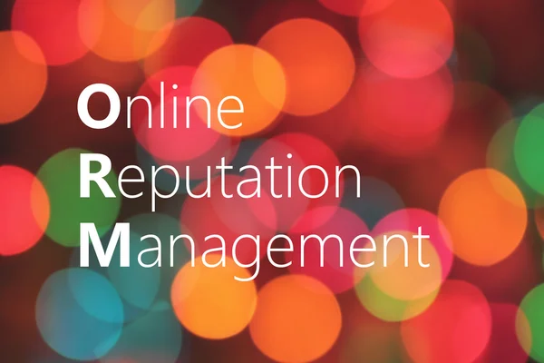ORM (Online Reputation Management) acronym on colorful bokeh bac