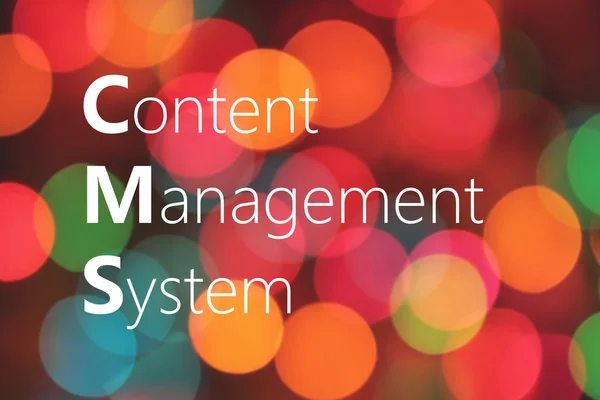 Content Management System (CMS) text on colorful bokeh background