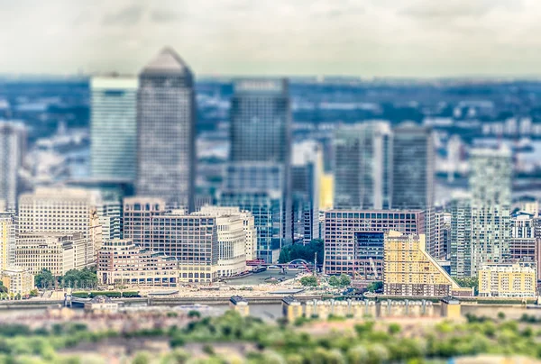 Aerial View of Canary Wharf District, London. Tilt-shift effect applied