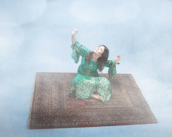Fairy tail woman flying on the carpet