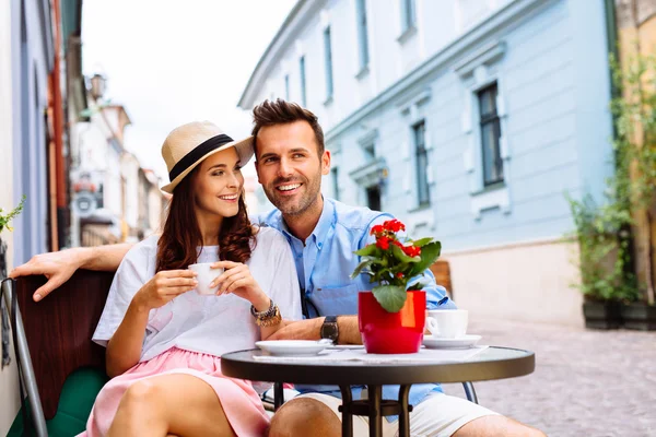 Tourists drinking coffee