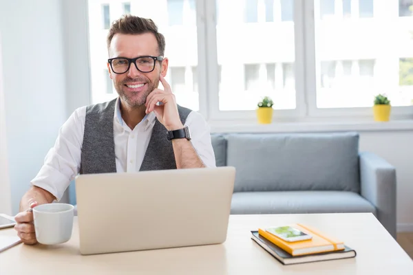 Man sitting at desk working