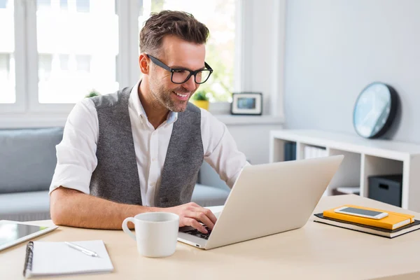 designer working on laptop